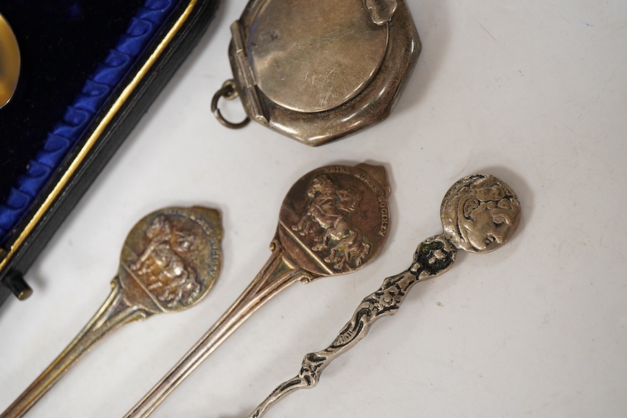 A modern silver shell dish on dolphin support, by Mappin & Webb, Sheffield, 1987, height 11cm, together with a cased set of six late Victorian parcel gilt silver apostle teaspoons, a 1960's small silver dish with Winston